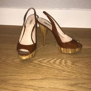 Designer Miu Miu slingback patent heels